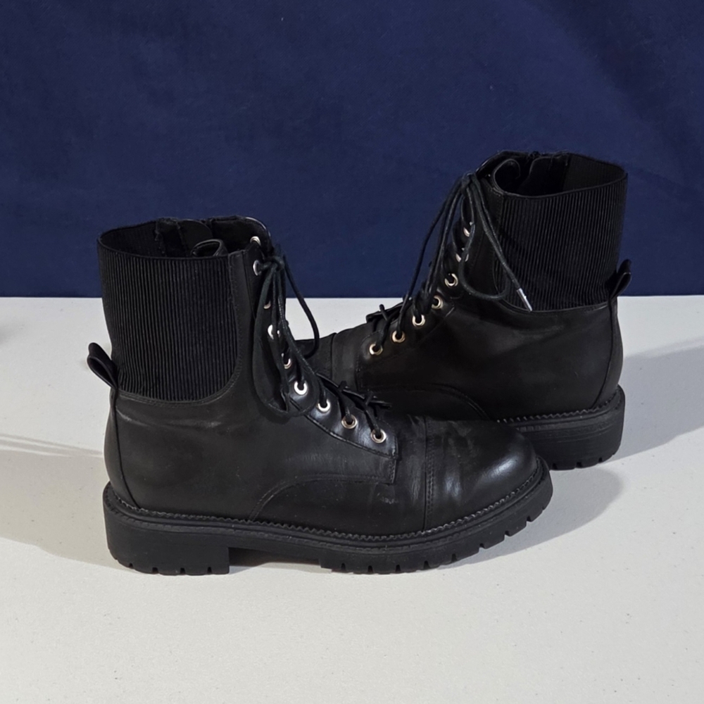 Black leather lace-up combat boots